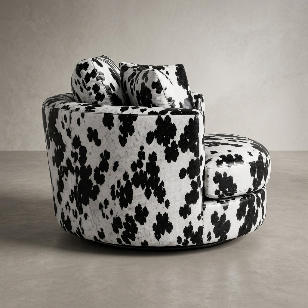 Cuddle Swivel Chair - Black Patch Cowhide Leather