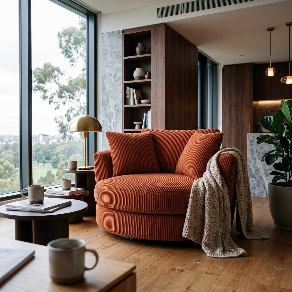 Cuddle Swivel Chair - Burnt Orange - Lifestyle Setting | Vibe Sofas